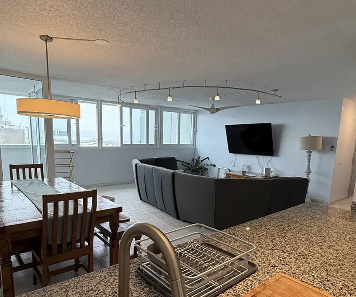 Salón desde cocina Beach Rentals